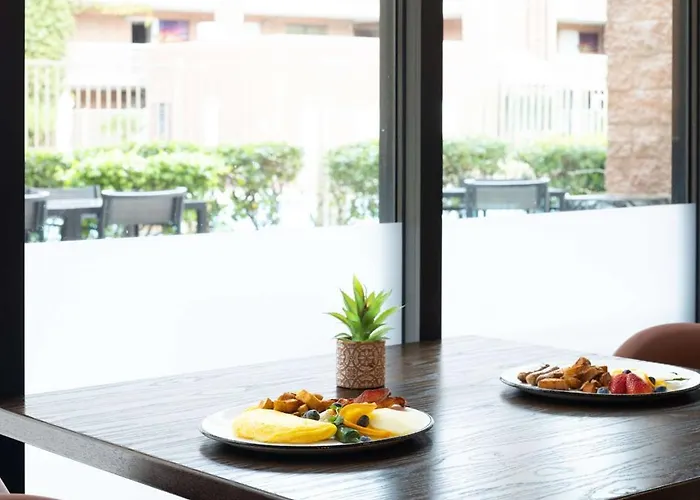 Embassy By Hilton East Hotel